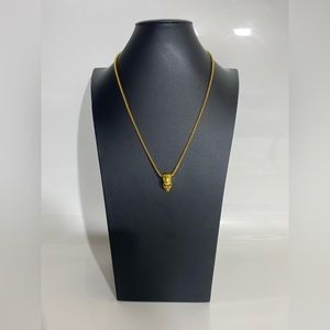 Gold skull necklace